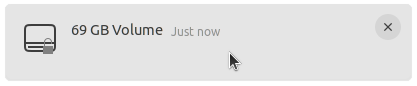 The "69GB volume" desktop notification from earlier, but now in the backlog tray, missing the action button